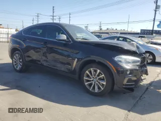 2018 BMW X6 sDrive35i z VIN 5UXKU0C54J0G69704, wystawiony jako Copart lot #57335475 z przebiegiem 61 777 mil mil oraz Szkoda całkowita • Salvage title. Historia ofert i sprzedaży dostępna na DreamBid. Obrazek 4.