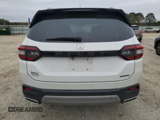 2024 Honda Pilot Touring z VIN 5FNYG2H74RB011187, wystawiony jako Copart lot #79999324 z przebiegiem 16 123 mil mil oraz Szkoda całkowita • Salvage title. Historia ofert i sprzedaży dostępna na DreamBid. Obrazek 6.