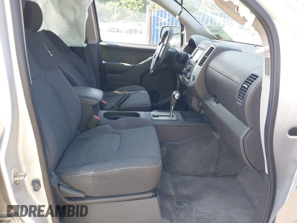 2018 Nissan Frontier SV with VIN 1N6AD0EVXJN743148, listed as a IAAI auction lot 42398810 with 82,286 mi miles and . Bid and sale history available at DreamBid. Image 5.