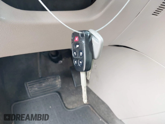 2012 Honda Odyssey EX-L with VIN 5FNRL5H61CB108301, listed as a IAAI auction lot 41939536 with 225,476 mi miles and . Bid and sale history available at DreamBid. Image 11.