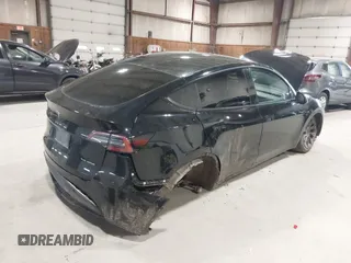 2022 Tesla Model Y Long Range z VIN 7SAYGDEE0NF342215, wystawiony jako IAAI lot #42136858 z przebiegiem 53 037 mil mil oraz . Historia ofert i sprzedaży dostępna na DreamBid. Obrazek 4.