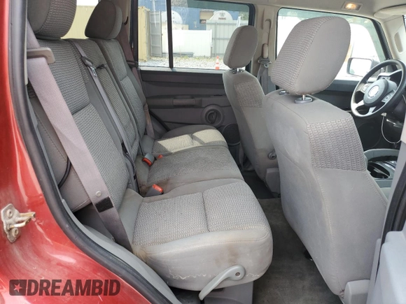2006 Jeep Commander z VIN 1J8HG48K76C131681, wystawiony jako Copart lot #64386985 z przebiegiem 142 135 mil mil oraz Szkoda całkowita • Salvage title. Historia ofert i sprzedaży dostępna na DreamBid. Obrazek 11.