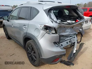 2016 Mazda CX-5 Grand Touring with VIN JM3KE4DY1G0616714, listed as a IAAI auction lot 41459781 with 90,763 mi miles. Bid and sale history available at carsss.com. Image 3.