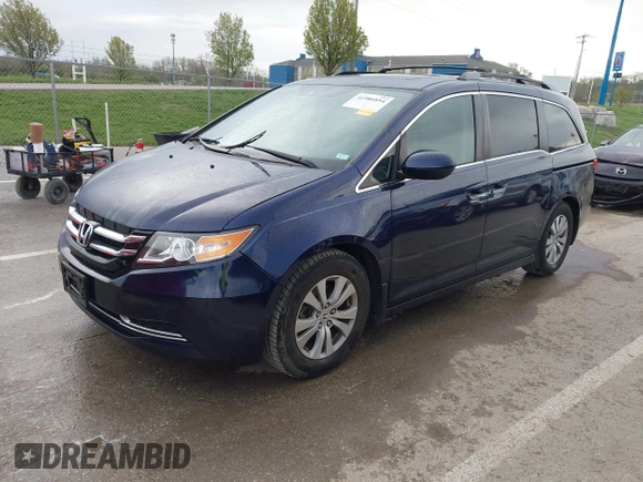 2014 Honda Odyssey EX-L with VIN 5FNRL5H68EB049914, listed as a IAAI auction lot 41986894 with 125,222 mi miles and . Bid and sale history available at carsss.com. Image 2.