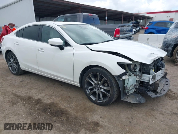 2017 Mazda 6 Grand Touring with VIN JM1GL1X57H1118646, listed as a IAAI auction lot 41896459 with 105,768 mi miles and . Bid and sale history available at carsss.com. Image 1.