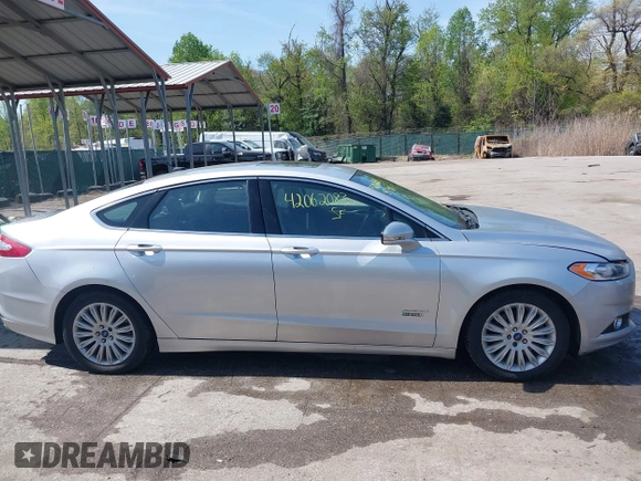 2016 Ford Fusion Energi SE Luxury with VIN 3FA6P0PU8GR273122, listed as a IAAI auction lot 42062083 with 166,318 mi miles. Bid and sale history available at carsss.com. Image 13.