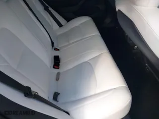 2022 Tesla Model 3 with VIN 5YJ3E1EA5NF111173, listed as a IAAI auction lot 41030634 with 99,337 mi miles. Bid and sale history available at carsss.com. Image 8.