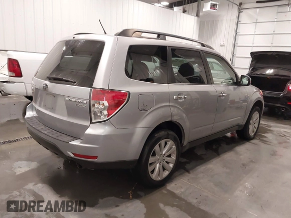 2013 Subaru Forester X Limited with VIN JF2SHAEC9DH424926, listed as a IAAI auction lot 41375493 with 121,809 mi miles and . Bid and sale history available at DreamBid. Image 4.