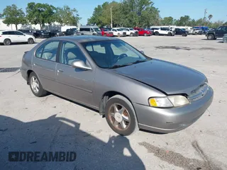 1999 Nissan Altima XE with VIN 1N4DL01D1XC255927, listed as a IAAI auction lot 42003101 with 154,000 mi miles. Bid and sale history available at carsss.com. Image 1.