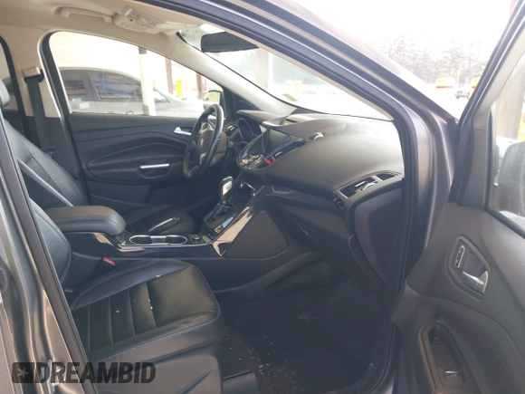 2014 Ford Escape Titanium with VIN 1FMCU9JX0EUC45801, listed as a IAAI auction lot 42121561 with 80,217 mi miles and . Bid and sale history available at DreamBid. Image 5.