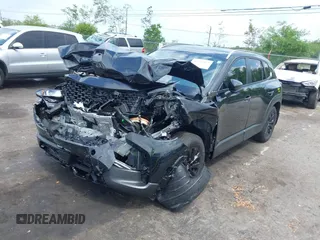 2025 Mazda CX-50 S Select with VIN 7MMVABAMXSN326118, listed as a IAAI auction lot 42136197 with 5,142 mi miles and . Bid and sale history available at DreamBid. Image 17.