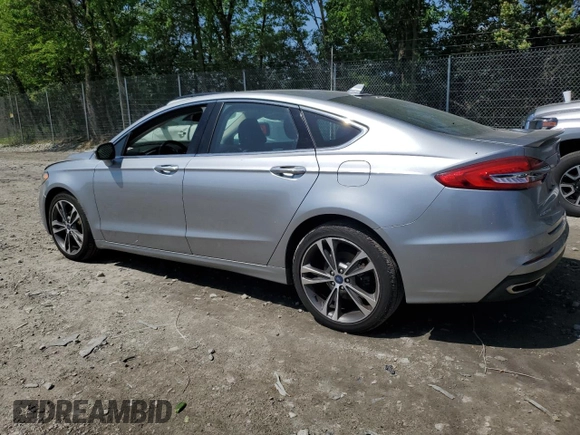 2020 Ford Fusion Titanium with VIN 3FA6P0D93LR180244, listed as a Copart auction lot 57102055 with 34,868 mi miles and Salvage title. Bid and sale history available at DreamBid. Image 2.