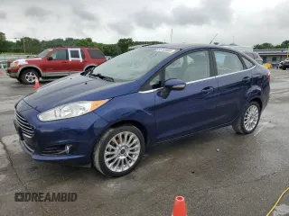 2016 Ford Fiesta Titanium z VIN 3FADP4CJ5GM185779, wystawiony jako Copart lot #55753465 z przebiegiem 118 233 mil mil oraz Czysty tytuł • Clean title. Historia ofert i sprzedaży dostępna na DreamBid. Obrazek 1.