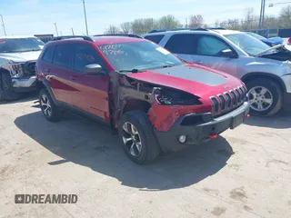 2016 Jeep Cherokee Trailhawk with VIN 1C4PJMBS9GW237059, listed as a IAAI auction lot 42079788 with 114,513 mi miles. Bid and sale history available at carsss.com. Image 1.