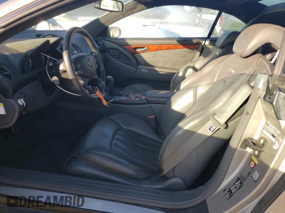 2005 Mercedes-Benz SL 55 AMG z VIN WDBSK74F45F089293, wystawiony jako Copart lot #85487394 z przebiegiem 34 153 mil mil oraz Szkoda całkowita • Salvage title. Historia ofert i sprzedaży dostępna na DreamBid. Obrazek 7.
