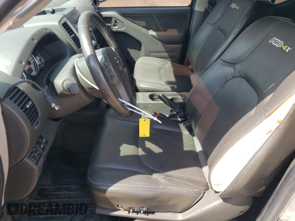 2016 Nissan Frontier Pro-4X with VIN 1N6AD0EV0GN797437, listed as a Copart auction lot 54203245 with 131,021 mi miles and Salvage title. Bid and sale history available at DreamBid. Image 7.
