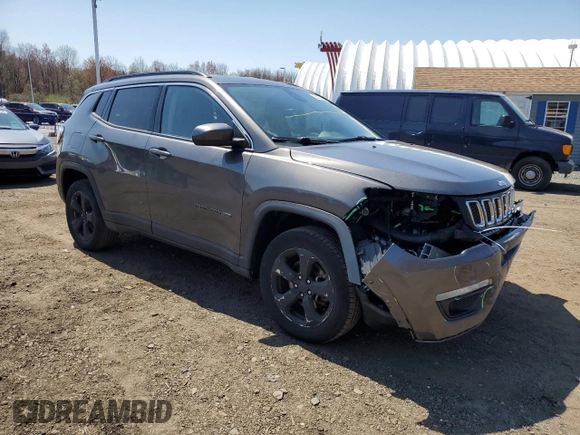 2018 Jeep Compass Latitude z VIN 3C4NJDBB5JT303871, wystawiony jako Copart lot #53881965 z przebiegiem 130 061 mil mil oraz Szkoda całkowita • Salvage title. Historia ofert i sprzedaży dostępna na DreamBid. Obrazek 4.