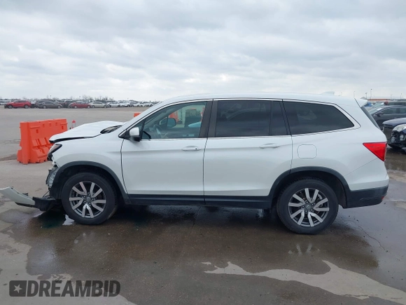 2021 Honda Pilot EX-L with VIN 5FNYF6H55MB031305, listed as a IAAI auction lot 41476636 with 58,754 mi miles. Bid and sale history available at carsss.com. Image 15.