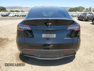 2024 Tesla Model Y Long Range with VIN 7SAYGAEE9RF125458, listed as a Copart auction lot 59567365 with 28,966 mi miles and Salvage title. Bid and sale history available at DreamBid. Image 6.