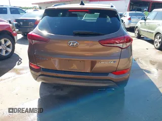 2016 Hyundai Tucson Limited with VIN KM8J33A25GU074798, listed as a IAAI auction lot 42103566 with 143,777 mi miles and . Bid and sale history available at carsss.com. Image 16.