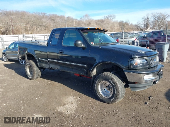 1997 Ford F-150 XL with VIN 1FTDX18W7VKC26527, listed as a IAAI auction lot 41692112 with 187,720 mi miles. Bid and sale history available at carsss.com. Image 1.