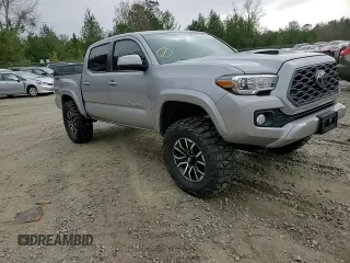 2020 Toyota Tacoma SR5 z VIN 3TMCZ5AN7LM308097, wystawiony jako Copart lot #48548315 z przebiegiem 83 628 mil mil oraz Szkoda całkowita • Salvage title. Historia ofert i sprzedaży dostępna na DreamBid. Obrazek 11.