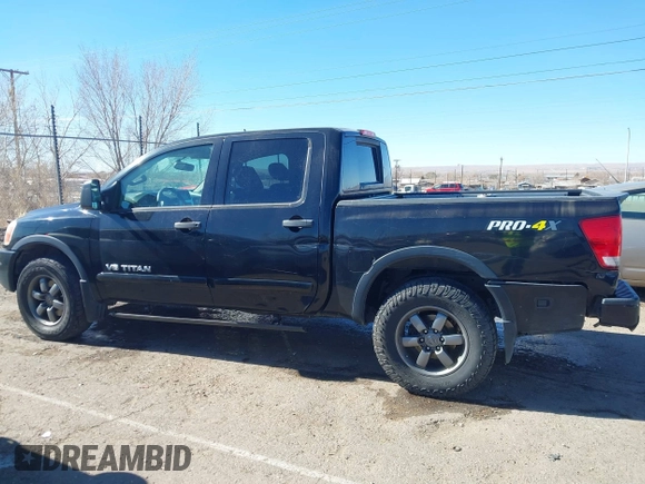 2014 Nissan Titan S with VIN 1N6AA0EC6EN506928, listed as a IAAI auction lot 41380319 with 102,669 mi miles and . Bid and sale history available at DreamBid. Image 14.
