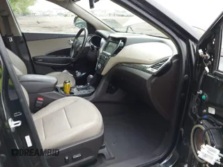 2017 Hyundai Santa Fe 2.4L z VIN 5XYZU3LB2HG434503, wystawiony jako IAAI lot #42197574 z przebiegiem 99 167 mil mil oraz . Historia ofert i sprzedaży dostępna na DreamBid. Obrazek 5.