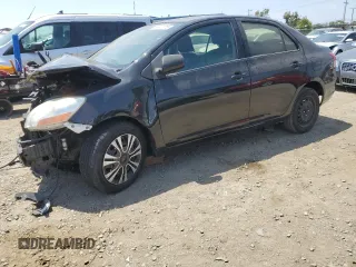 2009 Toyota Yaris z VIN JTDBT903394052355, wystawiony jako Copart lot #58447075 z przebiegiem 166 172 mil mil oraz Tytuł czysty. Historia ofert i sprzedaży dostępna na DreamBid. Obrazek 1.