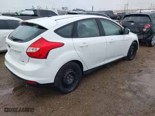 2012 Ford Focus SE with VIN 1FAHP3K20CL197291, listed as a IAAI auction lot 41643107 with 152,421 mi miles. Bid and sale history available at carsss.com. Image 4.