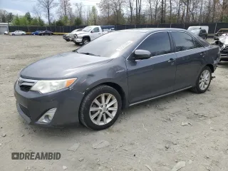 2012 Toyota Camry XLE z VIN 4T1BD1FK0CU061059, wystawiony jako Copart lot #52042905 z przebiegiem 159 506 mil mil oraz Szkoda całkowita • Salvage title. Historia ofert i sprzedaży dostępna na DreamBid. Obrazek 1.