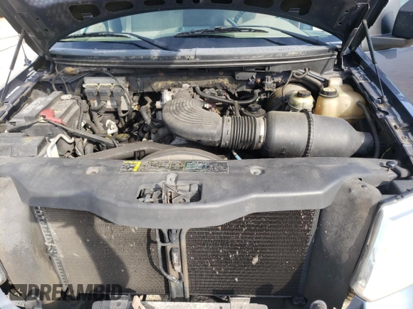 2004 Ford F-150 XL z VIN 1FTRF12WX4NB19843, wystawiony jako Copart lot #63184855 z przebiegiem 275 692 mil mil oraz Szkoda całkowita • Salvage title. Historia ofert i sprzedaży dostępna na DreamBid. Obrazek 11.