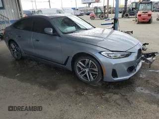 2022 BMW 4 Series 430i с VIN WBA63AV00NFM69588, выставлен на аукционе Copart как лот 50720105 с пробегом 22 047 миль миль и Списание • Salvage title. История ставок и продаж доступна на DreamBid. Изображение 4.