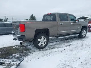 2015 Chevrolet Silverado 2500HD Built After Aug 14 High Country with VIN 1GC1KXE89FF543780, listed as a IAAI auction lot 41557608 with 164,171 mi miles. Bid and sale history available at carsss.com. Image 4.