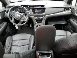2021 Cadillac XT5 AWD Sport z VIN 1GYKNGRS3MZ158562, wystawiony jako Copart lot #43593295 z przebiegiem 32 293 mil mil oraz Szkoda całkowita • Salvage title. Historia ofert i sprzedaży dostępna na DreamBid. Obrazek 8.