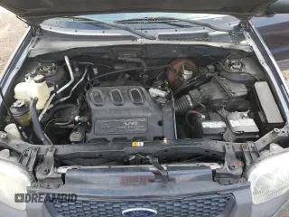 2004 Ford Escape XLS with VIN 1FMYU92104KA21454, listed as a Copart auction lot 74139564 with 217,731 mi miles and Salvage Title. Bid and sale history available at carsss.com. Image 13.