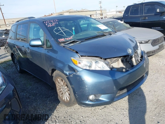2016 Toyota Sienna XLE with VIN 5TDYK3DC8GS720852, listed as a IAAI auction lot 41341268 with 119,927 mi miles. Bid and sale history available at carsss.com. Image 1.
