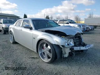 2005 Chrysler 300 C with VIN 2C3AA63H15H674199, listed as a Copart auction lot 47628215 with 154,052 mi miles and Salvage Title. Bid and sale history available at DreamBid. Image 10.