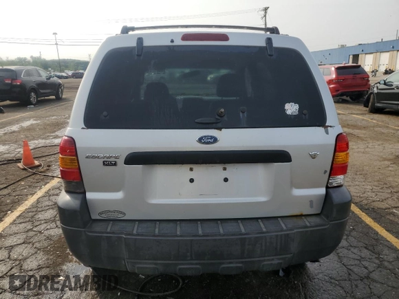 2006 Ford Escape XLT with VIN 1FMYU03196KC63432, listed as a Copart auction lot 66897524 with 214,049 mi miles and Clean Title. Bid and sale history available at DreamBid. Image 6.
