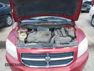 2007 Dodge Caliber SXT with VIN 1B3HB48B87D558516, listed as a IAAI auction lot 42004401 with 217,733 mi miles and . Bid and sale history available at DreamBid. Image 10.