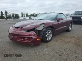 2000 Pontiac Firebird Firebird z VIN 2G2FS22K6Y2143127, wystawiony jako Copart lot #72041384 z przebiegiem 181 787 mil mil oraz Szkoda całkowita • Salvage title. Historia ofert i sprzedaży dostępna na DreamBid. Obrazek 1.