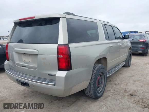 2017 Chevrolet Suburban Premier with VIN 1GNSCJKC4HR183592, listed as a IAAI auction lot 41514348 with 144,460 mi miles and . Bid and sale history available at DreamBid. Image 4.
