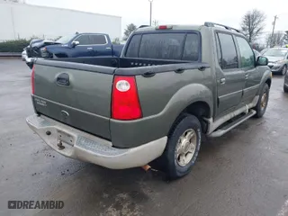 2003 Ford Explorer Sport Trac XLS with VIN 1FMZU77E13UC32685, listed as a IAAI auction lot 41428621 with 272,225 mi miles. Bid and sale history available at carsss.com. Image 4.