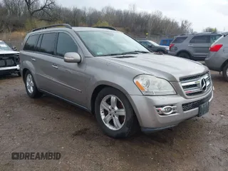 2007 Mercedes-Benz GL-Class with VIN 4JGBF71E67A244729, listed as a IAAI auction lot 41958181 with 128,727 mi miles. Bid and sale history available at carsss.com. Image 1.
