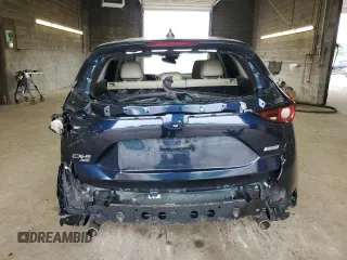 2018 Mazda CX-5 Touring z VIN JM3KFBCM3J0464815, wystawiony jako Copart lot #58794685 z przebiegiem Nie podano mil oraz Szkoda całkowita • Salvage title. Historia ofert i sprzedaży dostępna na DreamBid. Obrazek 6.