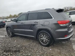 2017 Jeep Grand Cherokee Summit with VIN 1C4RJFJT1HC818136, listed as a Copart auction lot 81057084 with 135,843 mi miles and Salvage title. Bid and sale history available at DreamBid. Image 2.