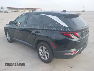 2022 Hyundai Tucson SE with VIN 5NMJA3AE7NH060409, listed as a IAAI auction lot 41884283 with 29,458 mi miles and . Bid and sale history available at carsss.com. Image 3.