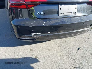 2017 Audi A8 with VIN WAU44AFD0HN017821, listed as a IAAI auction lot 41676097 with 107,378 mi miles and . Bid and sale history available at DreamBid. Image 6.
