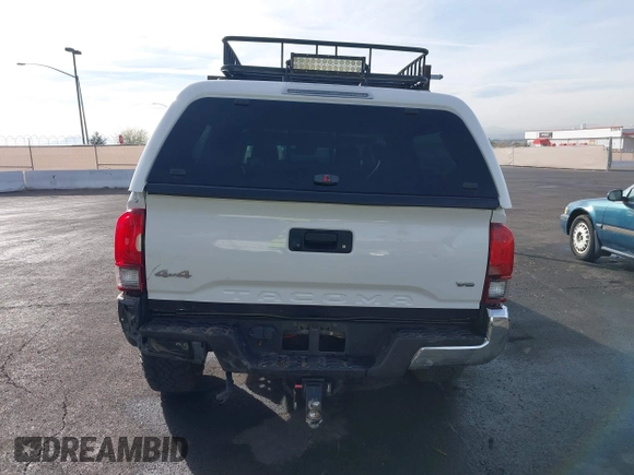 2019 Toyota Tacoma SR z VIN 3TMCZ5AN6KM284101, wystawiony jako IAAI lot #41099466 z przebiegiem 36 119 mil mil oraz . Historia ofert i sprzedaży dostępna na DreamBid. Obrazek 16.