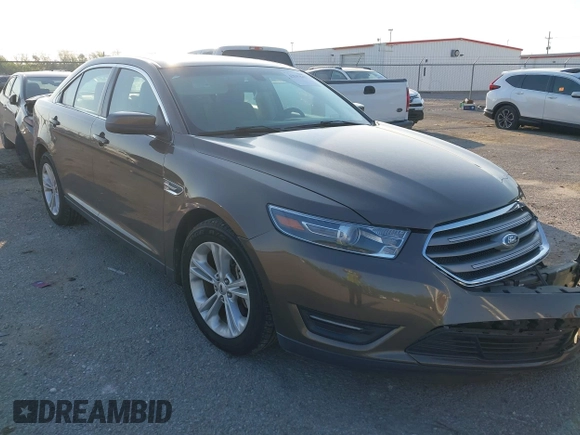 2015 Ford Taurus SEL z VIN 1FAHP2E84FG125243, wystawiony jako IAAI lot #42045847 z przebiegiem 42 093 mil mil oraz . Historia ofert i sprzedaży dostępna na DreamBid. Obrazek 1.
